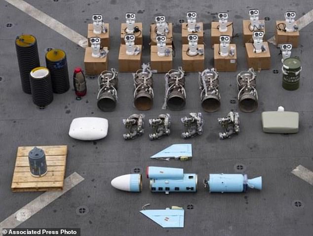 Iranian-made missile parts bound for the Houthi in Yemen have been seized from a ship in the Arabian Sea.  US Navy SEALs have seized Iranian-made missile parts and other weaponry from a ship bound for Yemen's Houthi rebels in a raid that left two of its commandos missing, the US military said Tuesday.