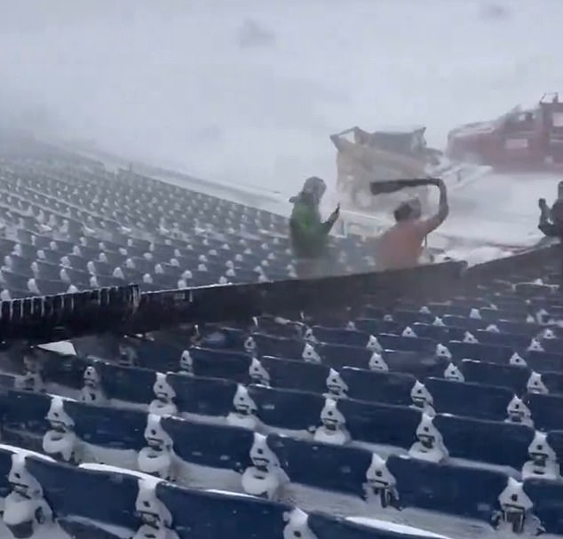 The fan seemed to be enjoying himself as he helped clear the field for $20 an hour