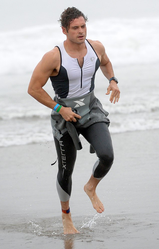 Adan Canto, pictured above in 2016 as he competed in a triathalon in Malibu, California, died at age 42 from appendiceal cancer after a private battle with the disease