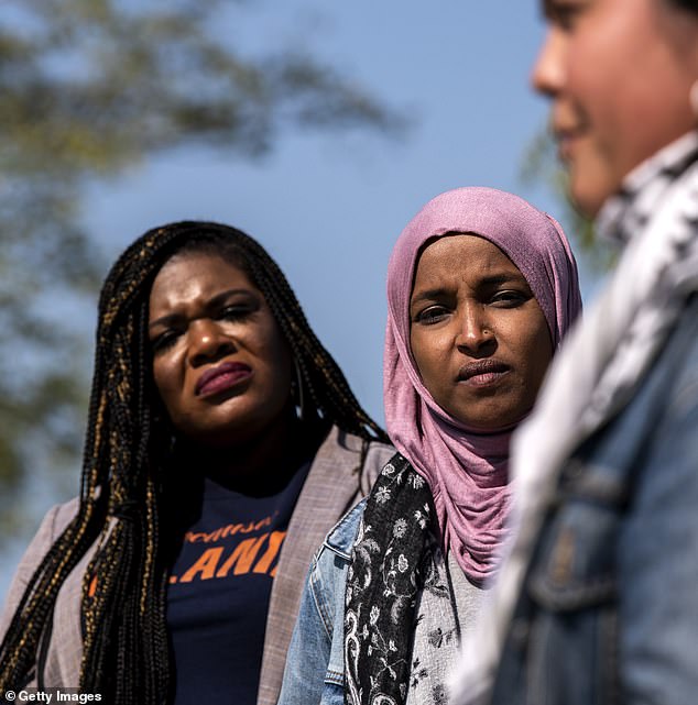 Rep. Ilhan Omar (right) jumped to the defense of her fellow team member (left) by accusing Rep. Troy Nehls of using racist language in his criticism of her