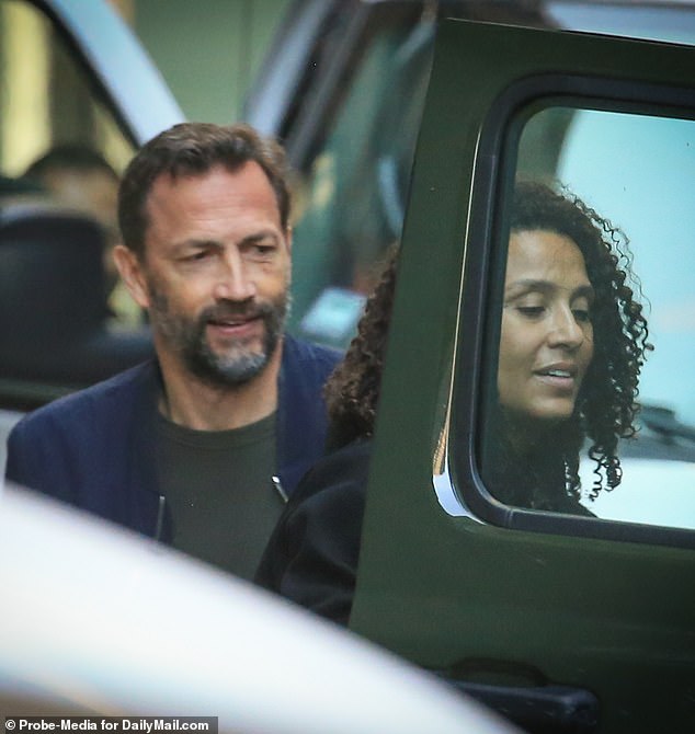 Don't they look happy!  DailyMail.com spotted Andrew Shue and Marilee Fiebig packing two cats into their car on Friday morning before heading out for the weekend