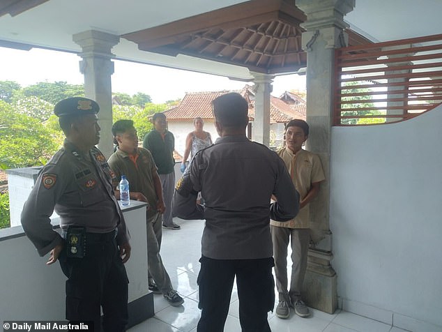 Denpasar police officers speak to staff at the Grand Sinar Inda Hotel where Mr Rockliffe was staying (pictured).  He was supposed to check out the next day