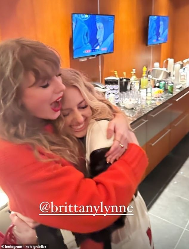 Taylor Swift wraps her arms around Brittany Mahomes during the Chiefs' postgame celebration