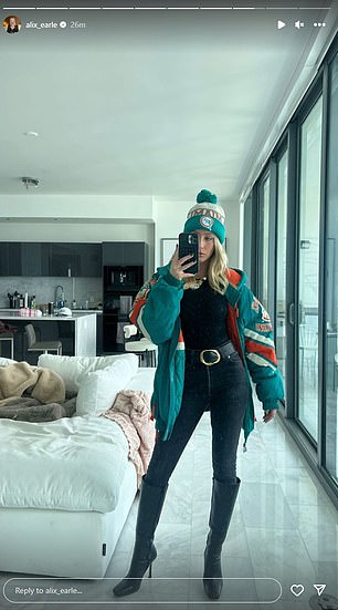 She posted several photos wearing Dolphins gear as she prepared for the cold weather at Arrowhead Stadium