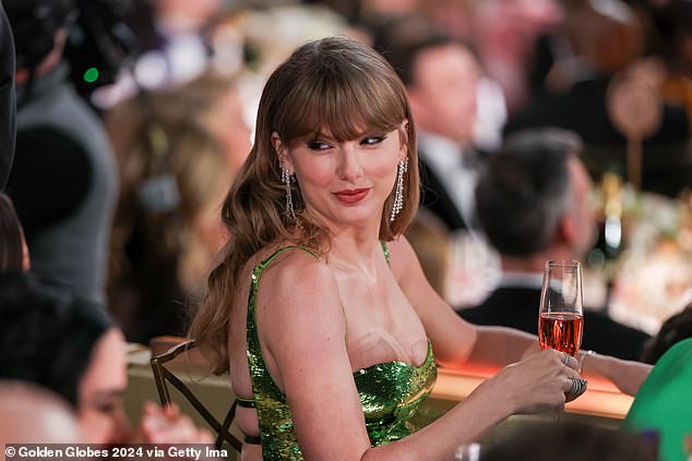 Early dipping: After the disappointing loss and enduring a 'low blow' about her love life during host Jo Koy's opening monologue, eagle-eyed fans noticed that the pop star, 34, appeared to quickly exit the awards show, which was being held at the Beverly Hills Hilton