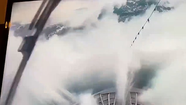 Terrifying footage shows how the huge wave crashed into the Norwegian ship, causing a power outage