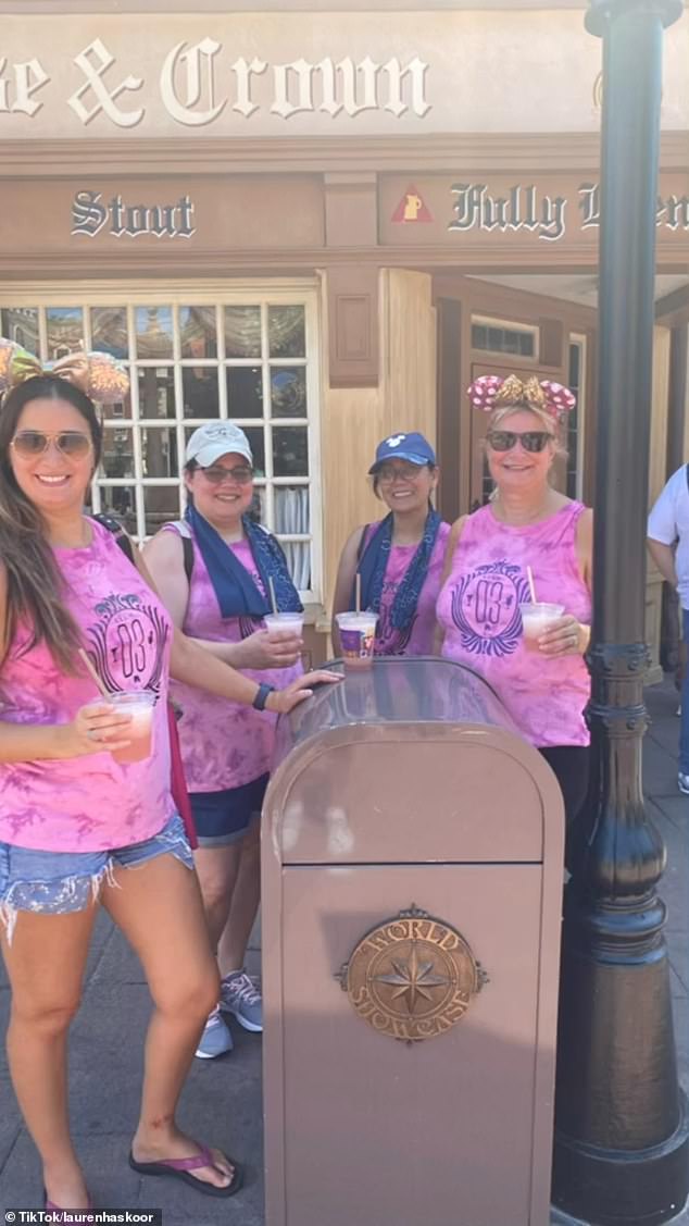 Members of the Disney Day Drinkers club are furious after the theme park moved a trash can that the group had officially christened as their mascot 'Binny' (pictured here with members of D3)