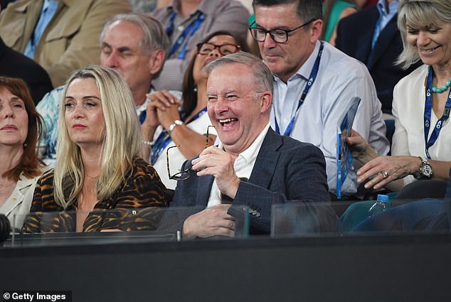 Prime Minister Anthony Albanese announced last week that the 37 percent tax bracket would remain in place for those earning between $135,000 and $190,000, as the 45 percent tax bracket would start at $190,000 instead of $200,000 (he is pictured on the right with his girlfriend Jodie Haydon at the Australian Open men's singles final in Melbourne on Sunday evening)