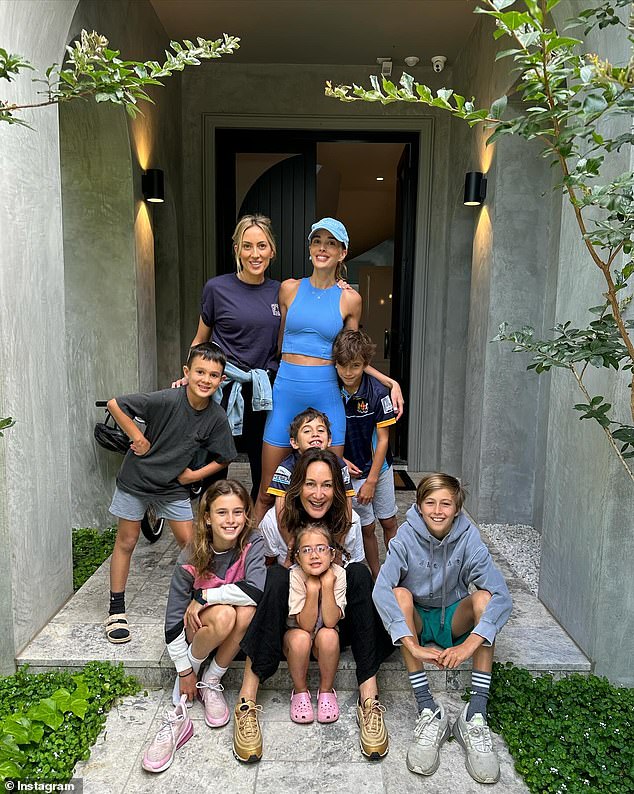 On Wednesday, the 40-year-old AFL WAG shared a 'photo dump' with fun snapshots from the Christmas and New Year period.  In the images, Bec smiled alongside her look-alike mum before posing for a family portrait with her sister Kate Twigley and all their children