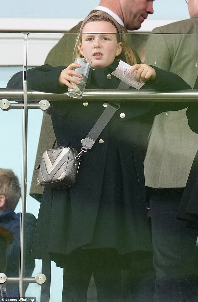 Mia Tindall wore a face of immense concentration as she visited Cheltenham Racecourse this afternoon