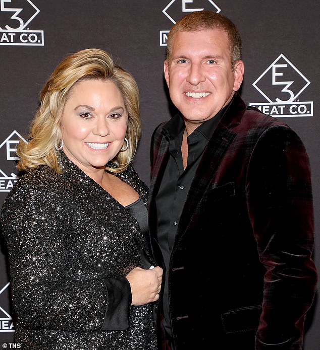 Todd and Julie Chrisley (pictured together in 2019) have secured a $1 million settlement from the state of Georgia after alleging misconduct in the investigation into their bank fraud and tax evasion.
