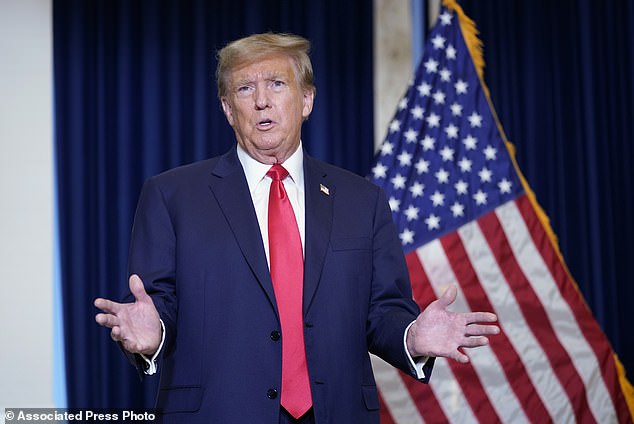 Former President Donald Trump speaks to the media at a hotel in Washington, Tuesday, January 9, 2024, after attending a hearing before the DC Circuit Court of Appeals at the federal courthouse in Washington