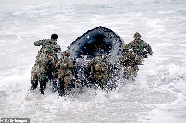 According to US officials, the soldiers were on an interdiction mission and climbing into a ship when a ship was capsized by high waves in rough seas on Saturday.  Depicted Navy SEALs on a mission