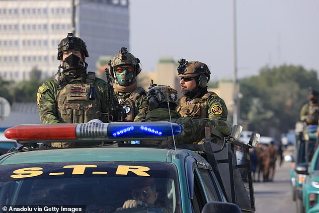 Iraqi security forces arrive at the site where Al-Nujaba senior commander Abu Taqwa Al-Saidi was killed in a US drone strike on January 4 in Baghdad, Iraq.