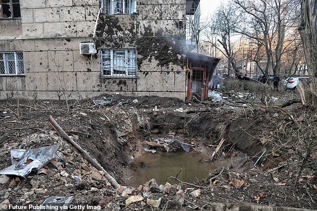 A crater formed by the wreckage of crashed Russian drones outside a residential building in one of the city districts, Odesa, Southern Ukraine