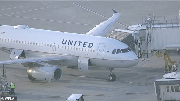 United Airlines jet is forced to make EMERGENCY LANDING after