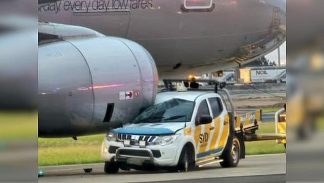 A Sydney Airport plane crashed into a Jetstar aircraft, trapping the pilot and forcing the plane to be taken out of service (pictured)