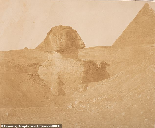 A Victorian travelogue containing photographs of an army officer and brilliant sketches of his world travels has sold for a whopping £168,000.  Above: An 1851 image of the Great Sphinx, when its chest and paws were still hidden by sand and rocks