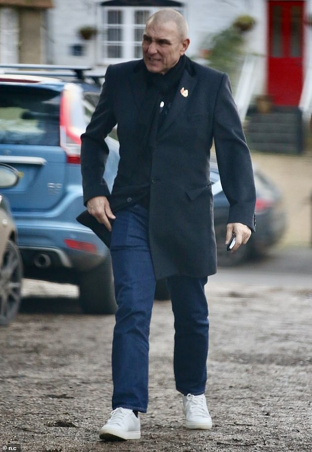 The star cut a casual figure in a black jacket with a pin on the lapel.  He was also wearing jeans when he entered the pub