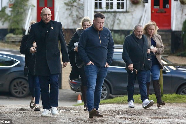 Vinnie Jones, 59, was in good spirits as he enjoyed Sunday lunch with a friend and two other women in rural Surrey