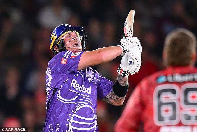 Ben McDermott hit a cricket ball onto the roof during Hobart Hurricanes' win