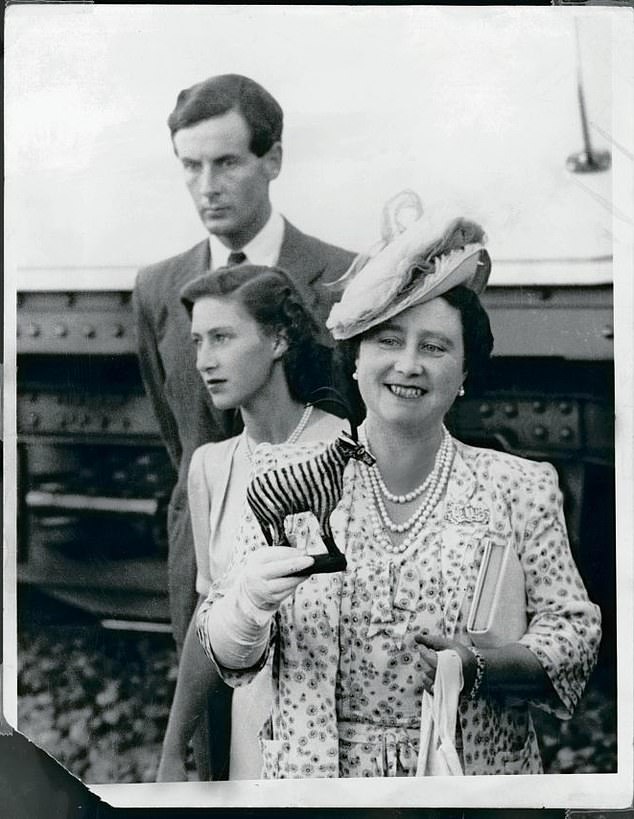 The late Queen Mother with Princess Margaret and Group Captain Peter Townsend pictured during a tour of South Africa in 1947. The Queen Mother was strongly opposed to Margaret and Townsend's engagement