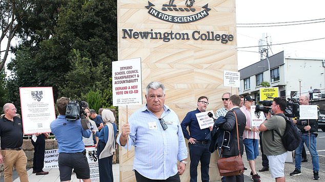 Retired construction executive Tony Ratsos, 63, (centre) graduated from Newington College in 1977 and sent his son to the school, but cried as he spoke out against the move to make it co-educational.