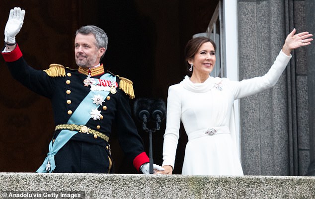 Denmark's new Queen Mary looked visionary in white as she waved to adoring fans alongside her husband, King Frederick X, on the balcony of Copenhagen's Christiansborg Palace.