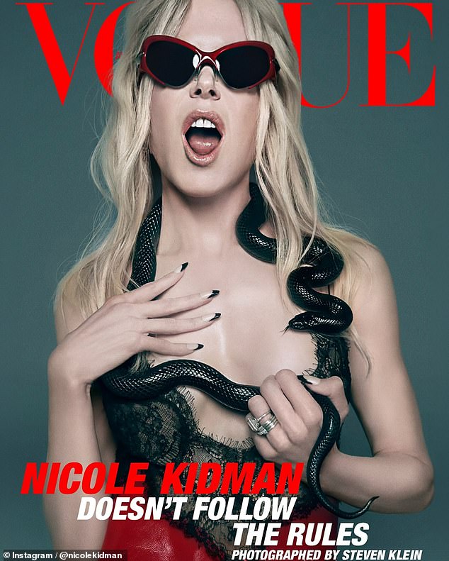 Nicole Kidman, 56, (pictured) graces the cover of the February issue of Australian Vogue magazine, wearing nothing but a sheer lace lingerie and a black hose wrapped around her shoulders