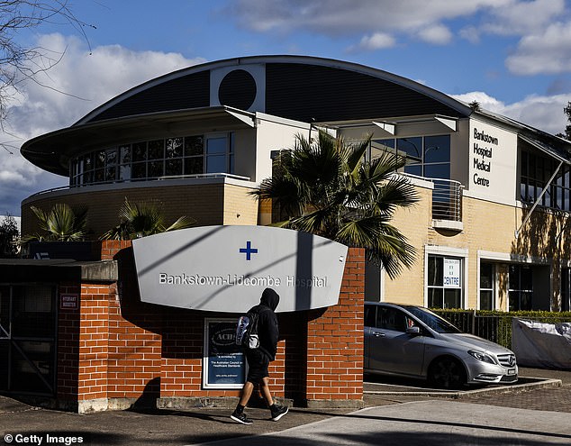 The 81-year-old woman is in a critical condition at Bankstown Hospital (pictured) in Sydney after being confronted by a man at 3am on Thursday