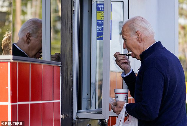 The 81-year-old used cash to buy the 'triple thick' black and white - made from vanilla and chocolate syrup - and then spooned it into his mouth