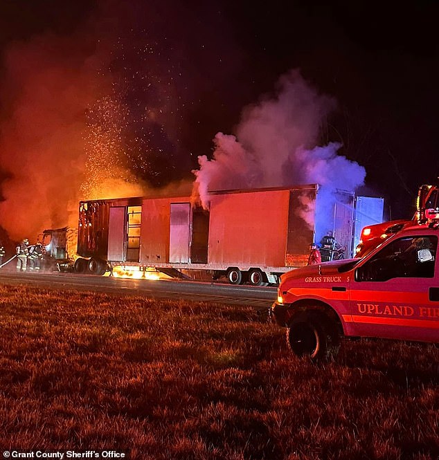 The tractor-trailer caught fire around 2 a.m. along Interstate 69 in Grant County, with police rescuing the five zebras, four camels and a miniature house.