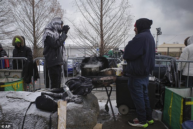 Democrat Governor Hochul was asked at an event on Wednesday whether the migrants and perpetrators like them should face deportation.  Pictured: Migrants on Randall's Island