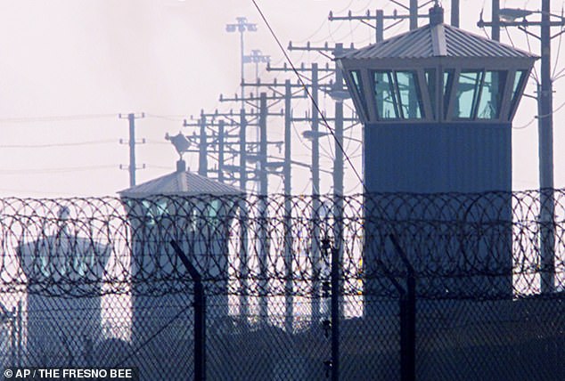 Three watchtowers line the western edge of Corcoran State Prison in Corcoran, California