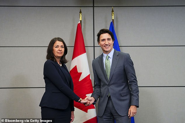 Smith is seen with Justin Trudeau in February 2023, at a rally in Ottawa