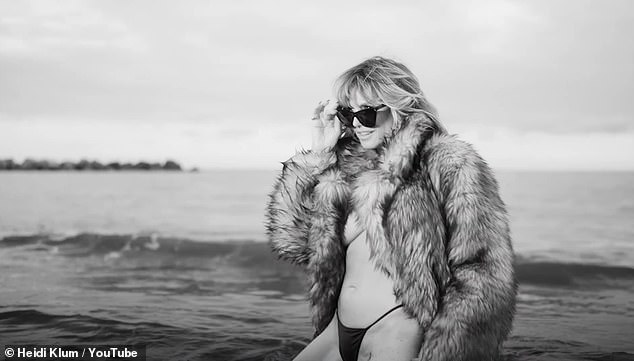 1706763796 81 Heidi Klum 50 is TOPLESS while wearing a fur coat