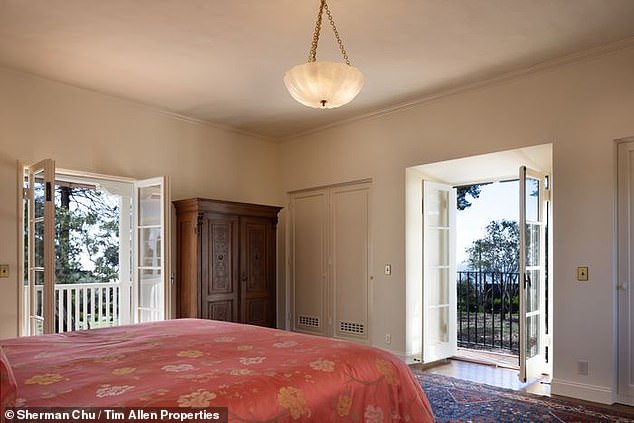 The unique Douglas fir and terra cotta floors were retained while the kitchen and primary bathrooms were renovated