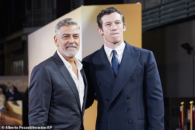 Barrymore says George Clooney told her: "You never maintain eye contact with people in a scene,"', prompting her to clarify the comment.  'I'm like, "Because it's so intimate.  Should we kiss while we're at it?" For example, eye contact is insane';  Clooney is pictured with Callum Turner, who worked together on biographical sports drama The Boys In The Boat