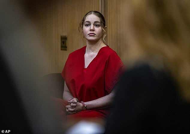 Clenney seen in a courtroom during a preliminary hearing in December 2022. She is currently on trial for Obumseli's murder