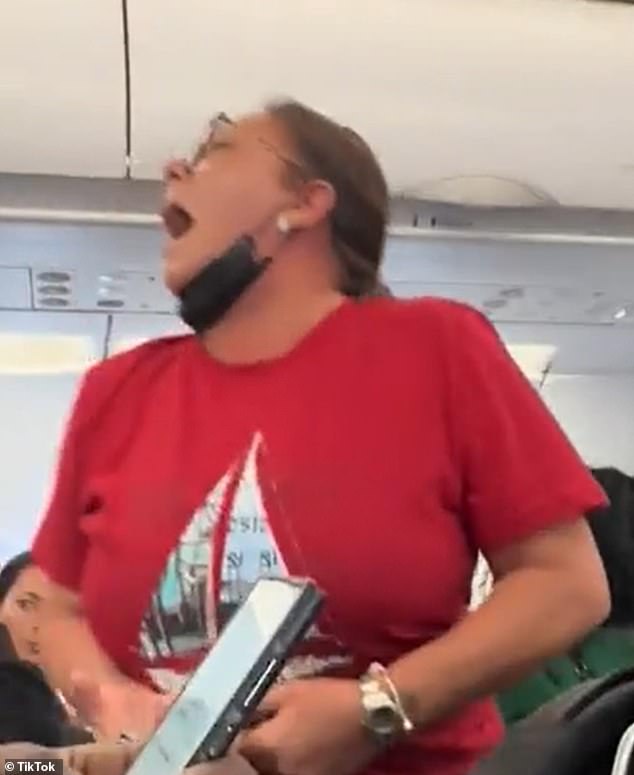 She allegedly yelled and cursed at a flight attendant who asked her to remain seated, the complaint states