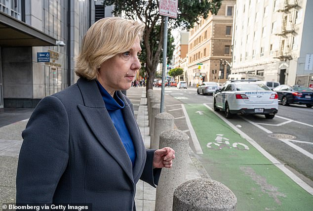 Ms Denholm (pictured outside court in San Francisco) owns several properties in Sydney and has been on the AFR's Rich List since 2021