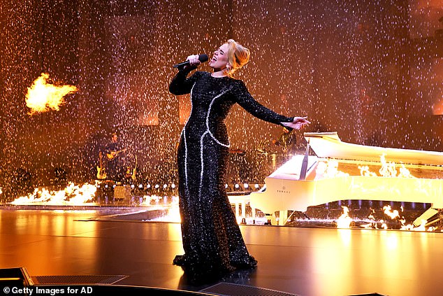 Adele performs on stage during 