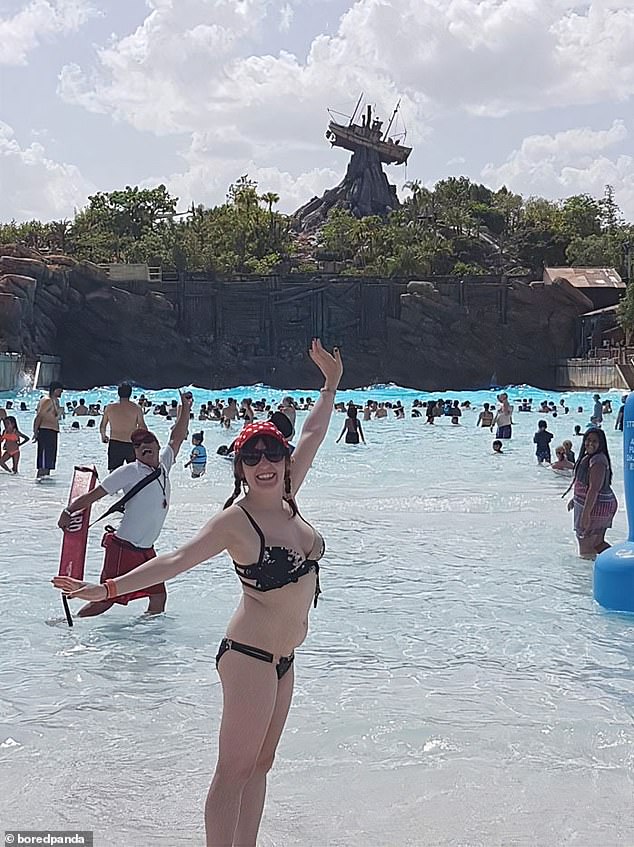 Who said saving lives can't be great?  A lifeguard strikes the perfect pose at Disney's Typhoon Lagoon