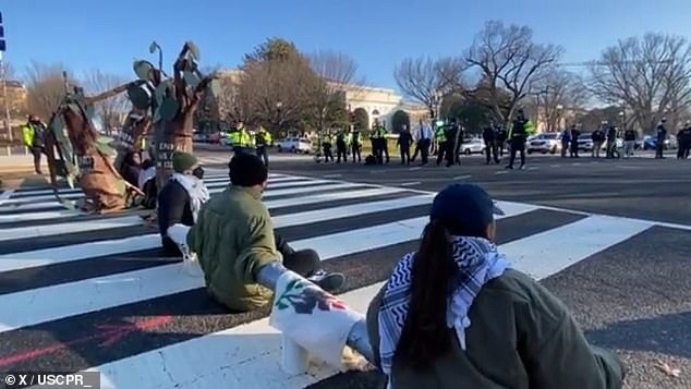 You can hear protesters chanting, “Free Palestine, long live Palestine,” while angry commuters can be heard continuously honking their horns.