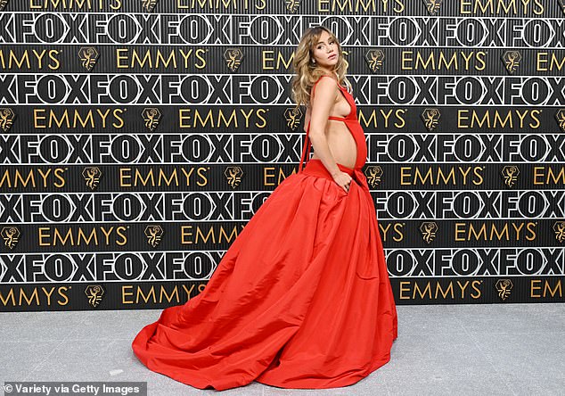 This comes after she made quite the impression at the Emmy Awards last month in a nude dress with a long train.  Waterhouse had her Emmy dress redesigned to fit her growing baby bump