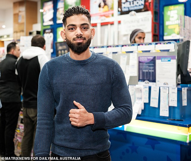 The winning numbers in Powerball draw 1446 on Thursday, February 1, 2024 were 12, 33, 23, 35, 1, 26 and 32​.  The all-important Powerball number was 10. Pictured: A man in a Lotto store in Sydney