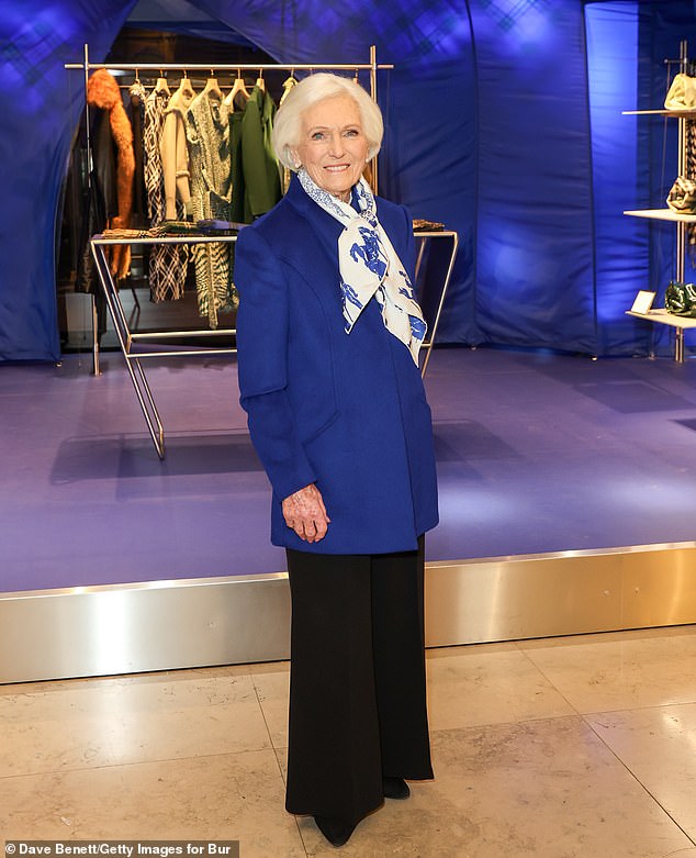 Mary looked stunning in a blue jacket and black wide leg trousers