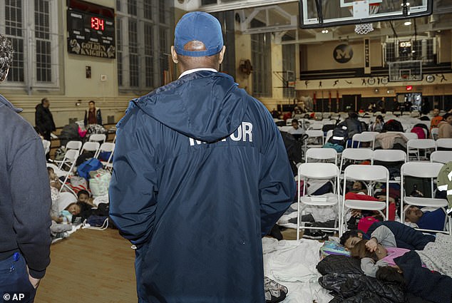 New York's Democratic Mayor Eric Adams agreed that it is time to explore deportation.  Adams is pictured visiting asylum seekers seeking shelter at James Madison High School in Brooklyn