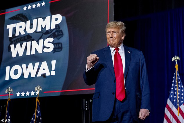 Donald Trump takes the stage during a caucus night party in Des Moines, Iowa, on January 15, 2024