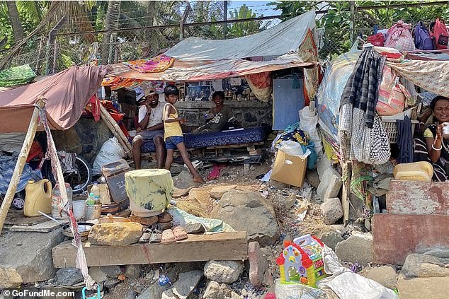 The teenager, who sleeps in the slum with her father and younger brother and sister, said they have no electricity